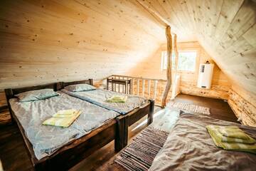 Фото номера Дом с 1 спальней Дома для отпуска Jūrkalnes Meža SPA г. Ošvalki 5