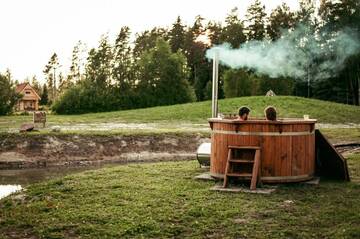 Фото номера Дом с 1 спальней Дома для отпуска Jūrkalnes Meža SPA г. Ošvalki 94