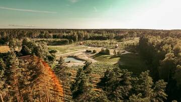 Фото номера Дом с 1 спальней Дома для отпуска Jūrkalnes Meža SPA г. Ošvalki 79